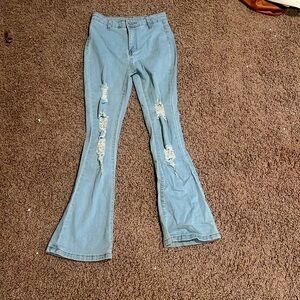ripped bell bottom jeans